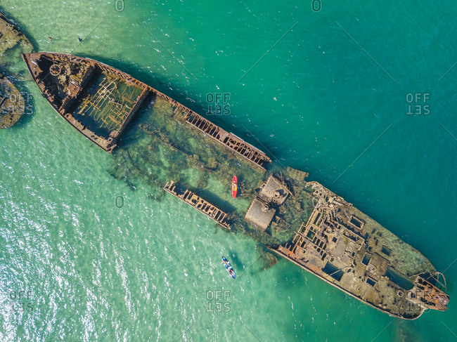Aerial view of kayak and Tangalooma shipwrecks in Moreton Bay, Australia