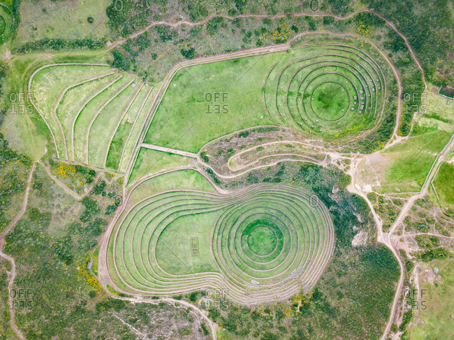 Aerial view of terraced circular depressions of Moray archeological site, Peru