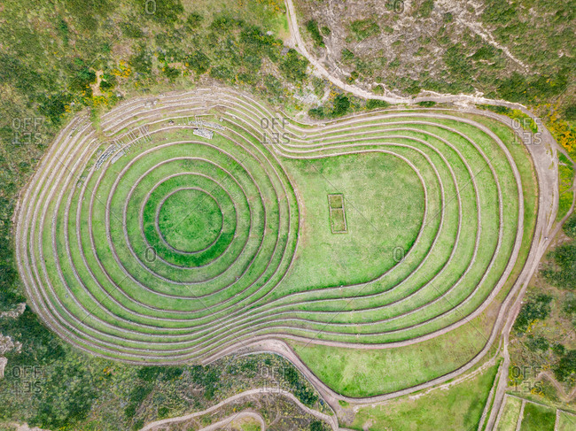 Aerial view of terraced circular depressions of Moray archeological site, Peru