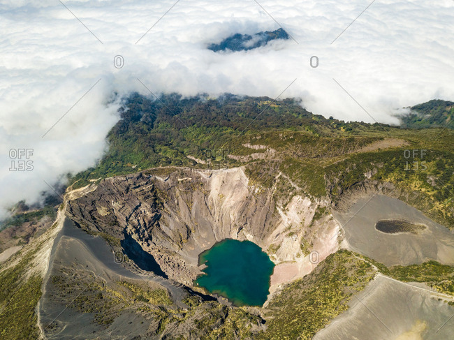 Aerial panoramic view of active Irazu volcano in clouds, Cartago, Costa Rica
