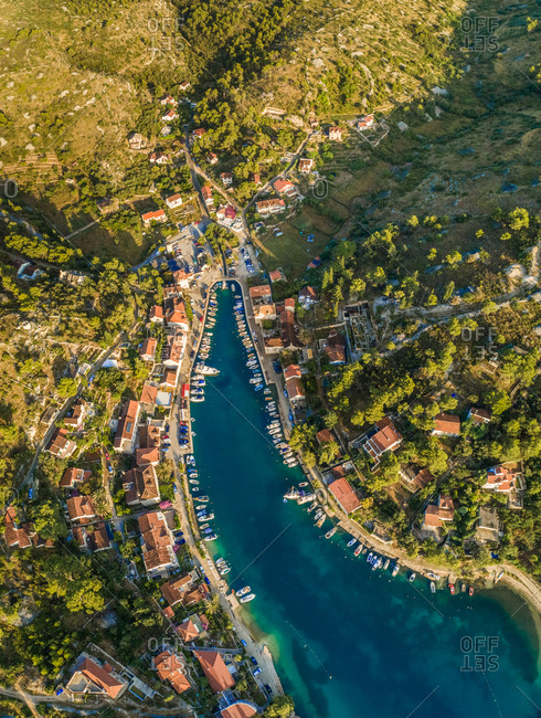 Aerial view of boats, buildings and hills, Sutivan town, Brac island, Croatia