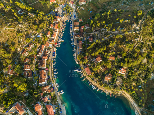 Aerial view of boats in harbour and Sutivan town, Brac island, Croatia
