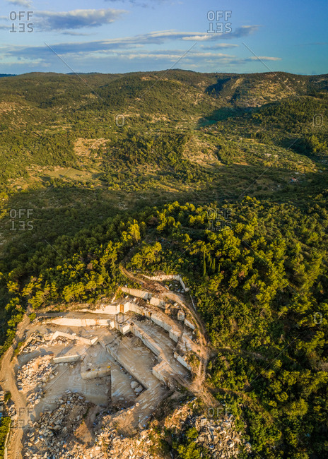 Aerial panoramic view of quarry, white Brac stone and hills, Brac island Croatia