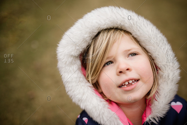 Little girl in a furry hood