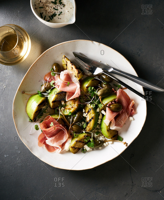 A bowl of Charred Green Tomato Salad