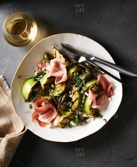 A bowl of Charred Green Tomato Salad