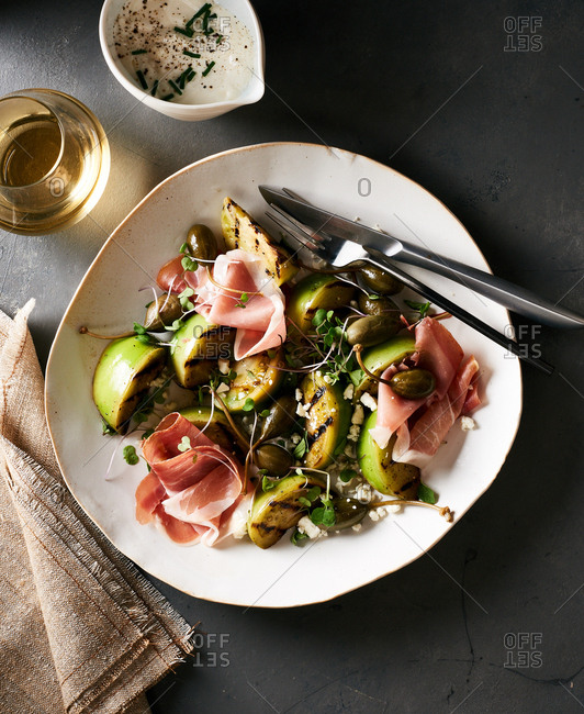 A bowl of Charred Green Tomato Salad