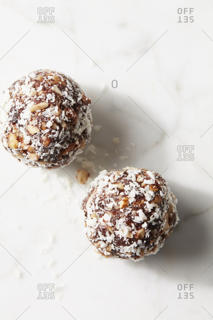 Two chocolate coconut protein ball