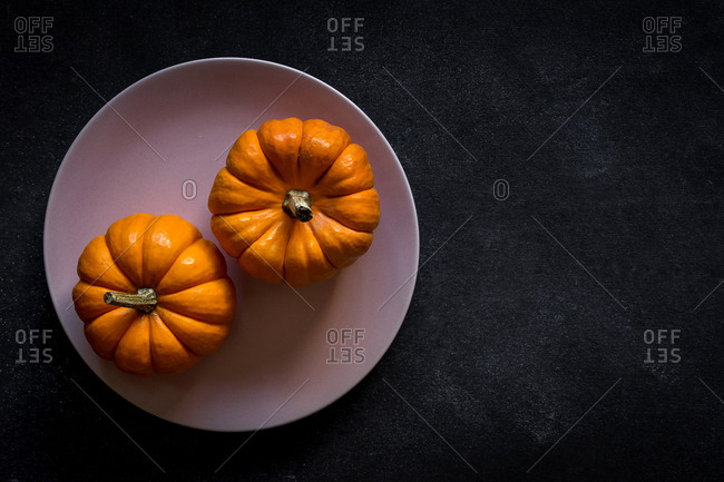 Halloween decoration background on dark background. Pumpkins. Flat lay. Copy space