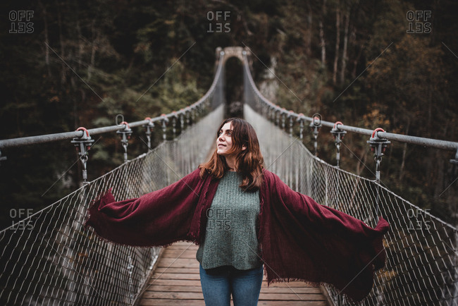 Young lady on hanging bridge