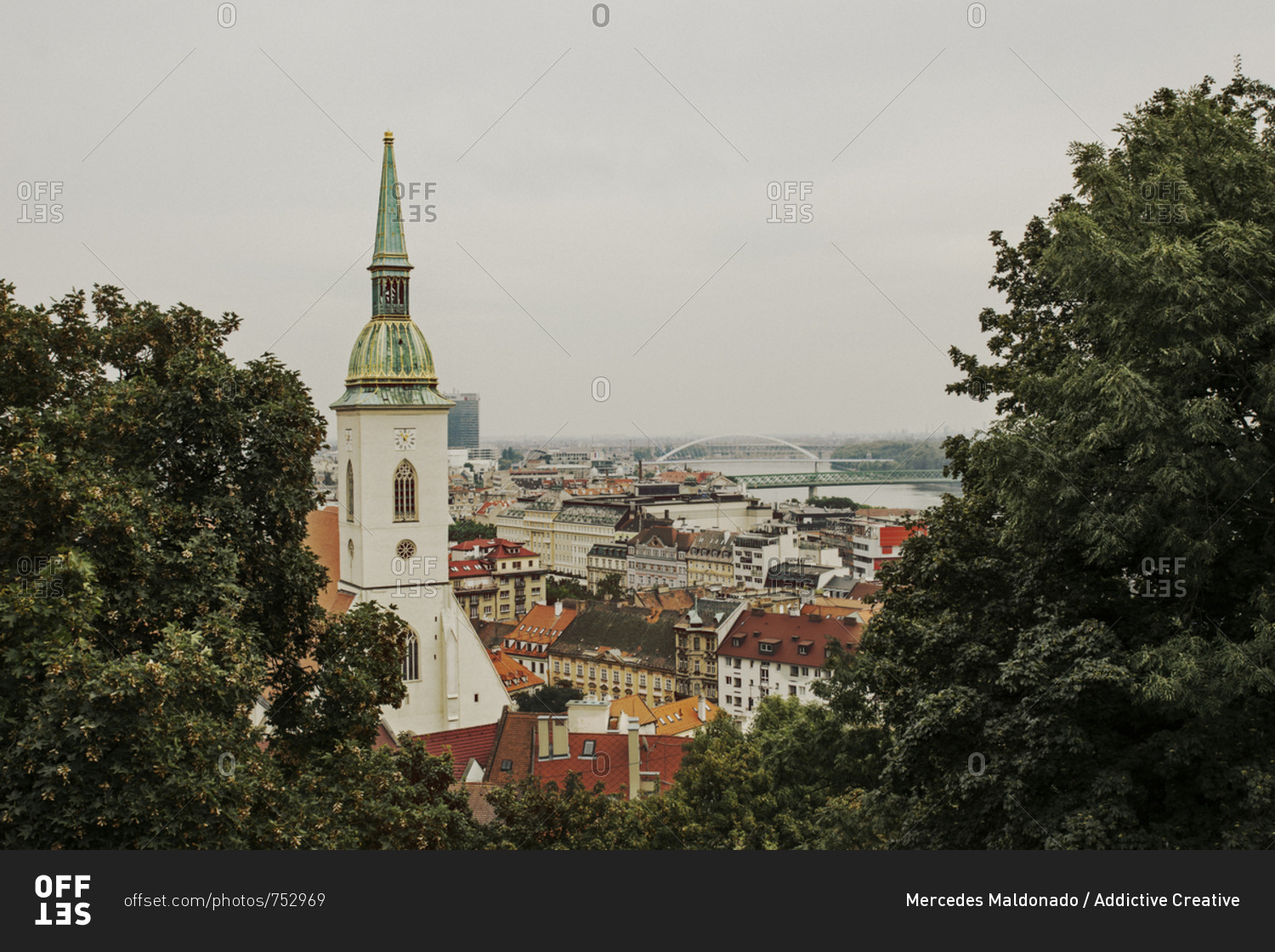 BRATISLAVA, SLOVAKIA, OCTOBER 2, 2016: Bratislava sky line from the castle hill. In the foreground is the St. Martin's cathedral and the old town.