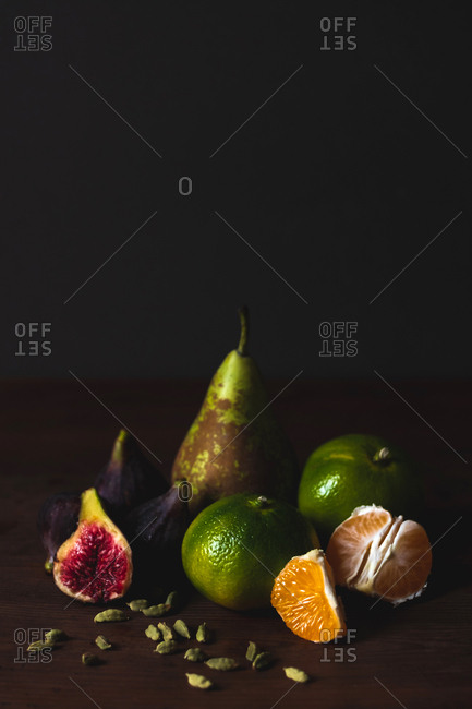Delicious ripe fruits on table board