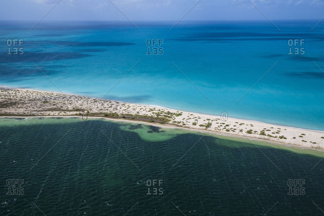 Aerial view of the turquoise caribbean sea framed by fine sand beaches Barbuda Leeward Islands West Indies