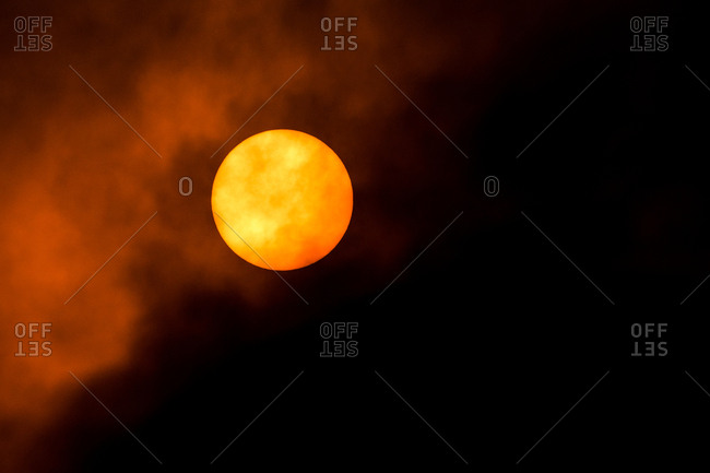 View of sun in smoky sky