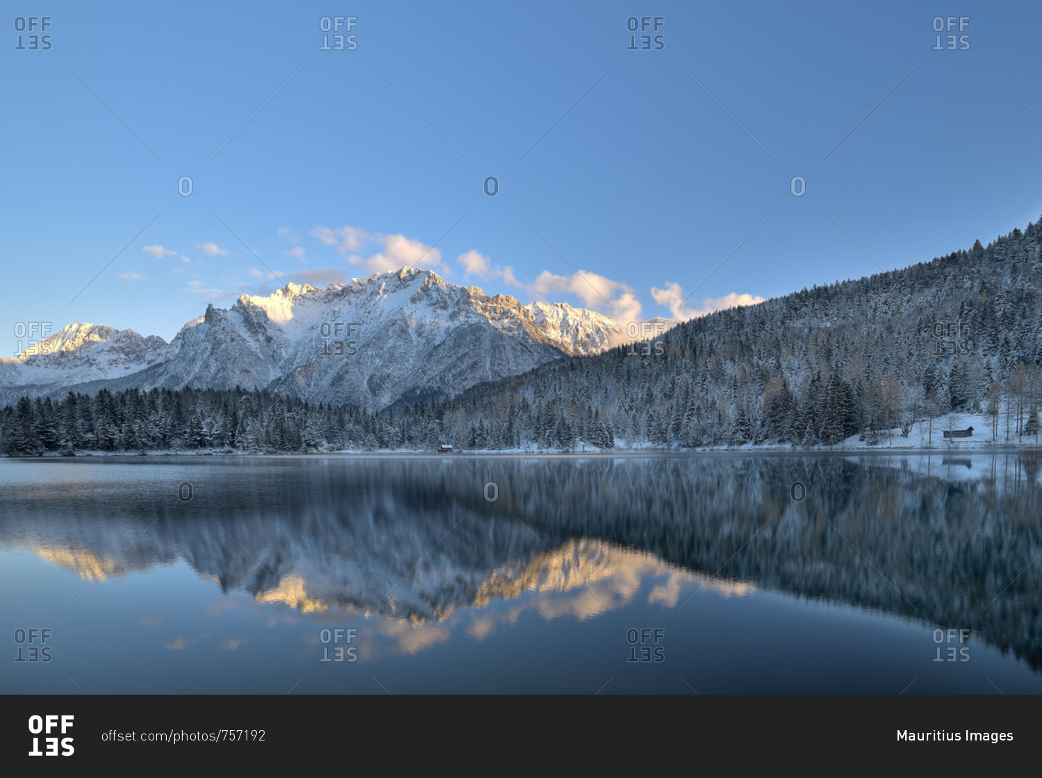 Mirroring of the Karwendelgebirge (mountains)s in the wintry Lautersee (lake)
