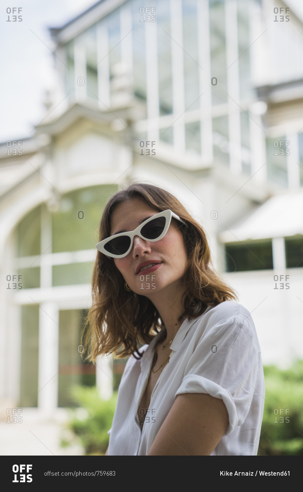 Young woman sight seeing in Madrid- wearing sunglasses
