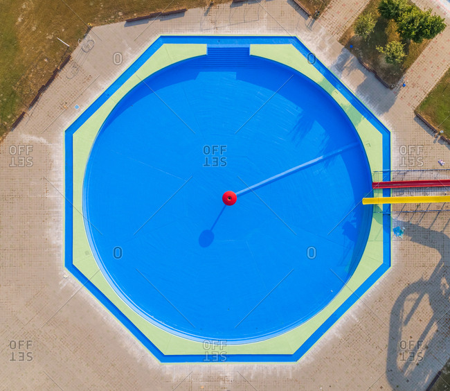 Abstract aerial view of pool in abandoned water park.