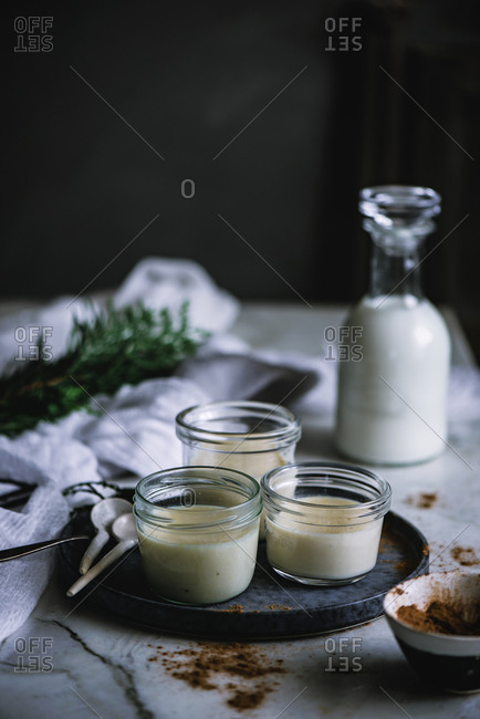 Jars with custard and chocolate desert