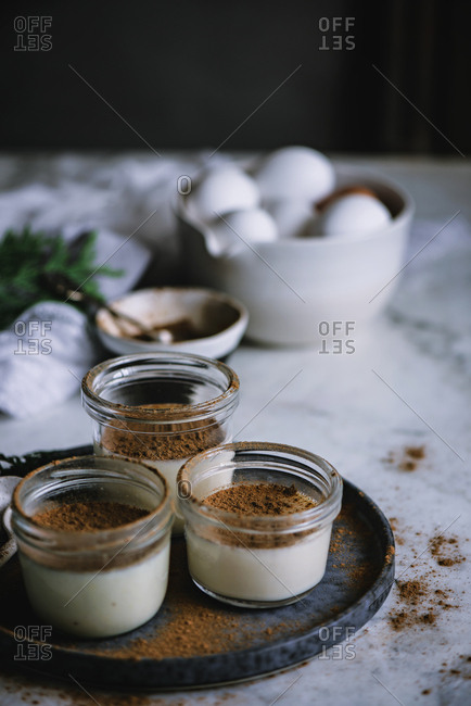 Jars with custard and chocolate desert