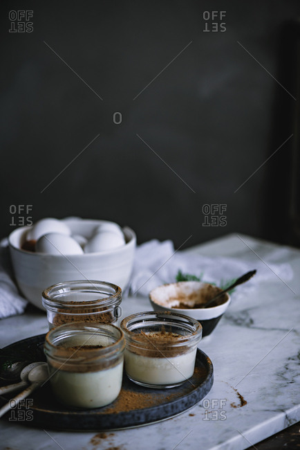 Jars with custard and chocolate desert