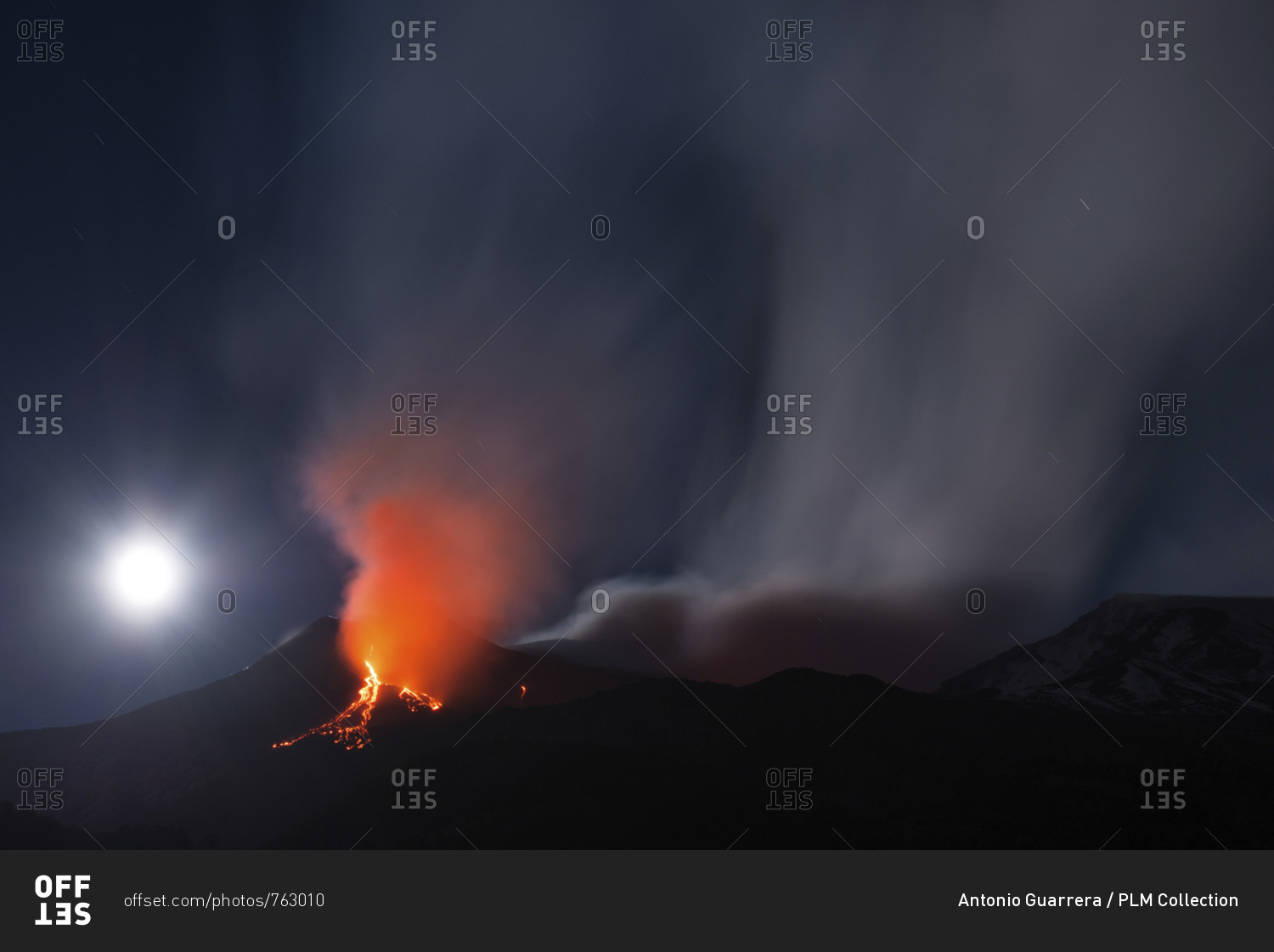 Etna and the moon in a nighttime eruption, Etna mount, Sicily, Italy, Europe
