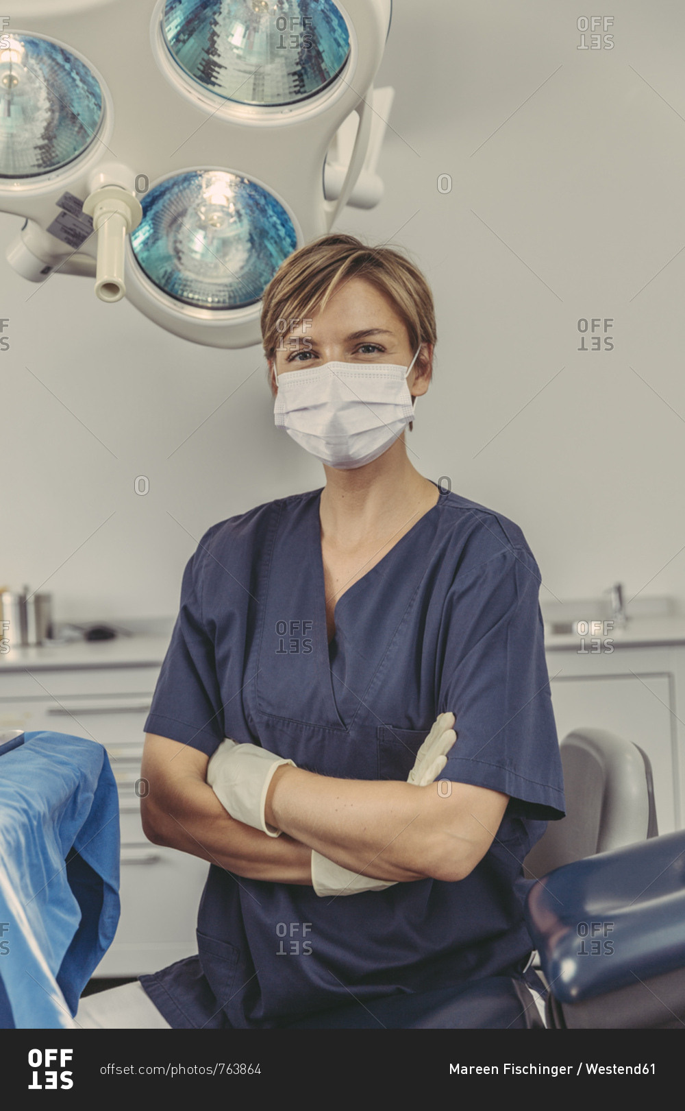 Dental surgeon wearing surgical mask- portrait