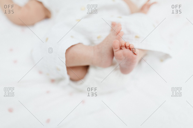 Newborn baby's bare feet - Offset
