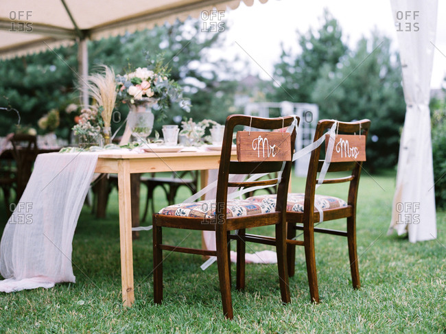 Mr And Mrs Chairs At An Outdoor Wedding Stock Photo Offset
