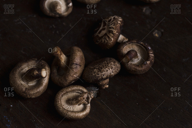 Shiitake mushrooms on old wooden table