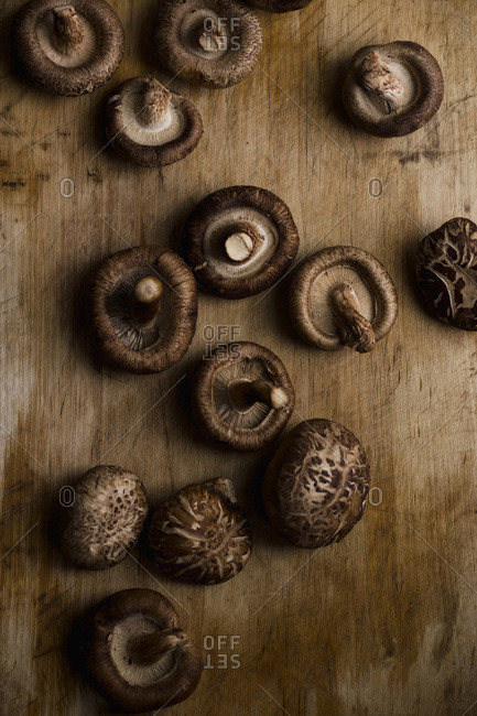 Shiitake mushrooms on old wooden table