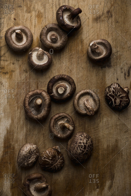Shiitake mushrooms on old wooden table