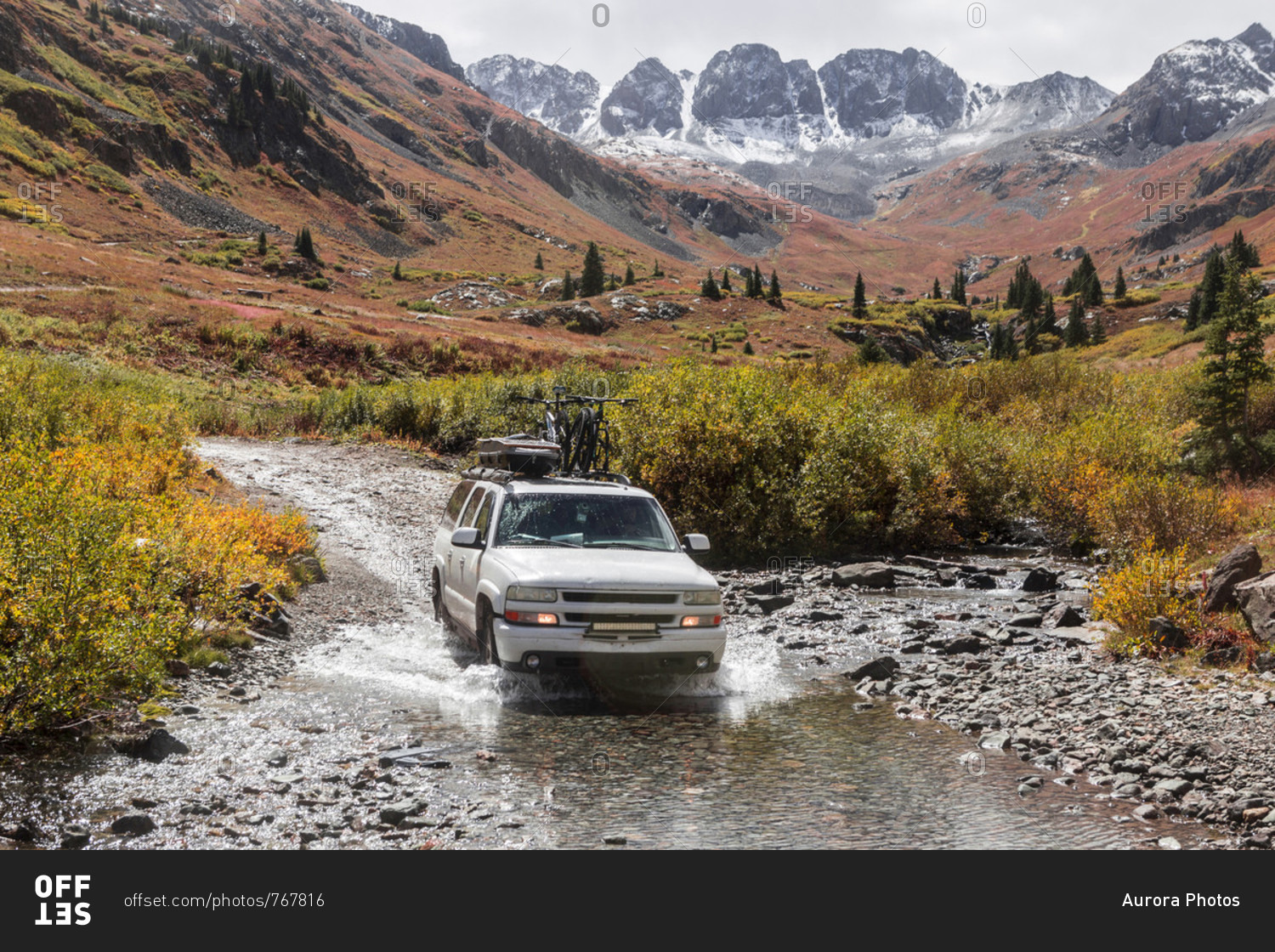 4x4 car driving in natural scenery with mountains at Alpine Loop, Colorado, USA