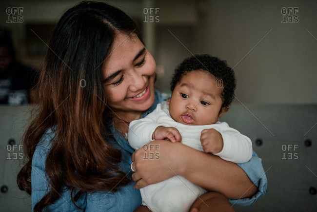 Portrait of mother with her happy baby