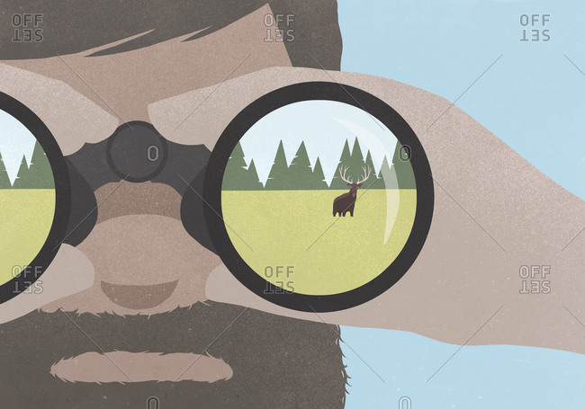 Reflection of moose in field in binoculars held by a man with a beard