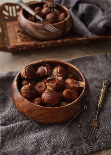 Roasted chestnuts in a wooden bowl