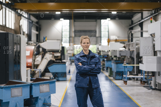 Young woman working as a skilled worker in a high tech company- portrait