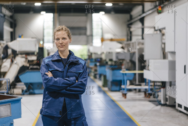 Young woman working as a skilled worker in a high tech company- portrait