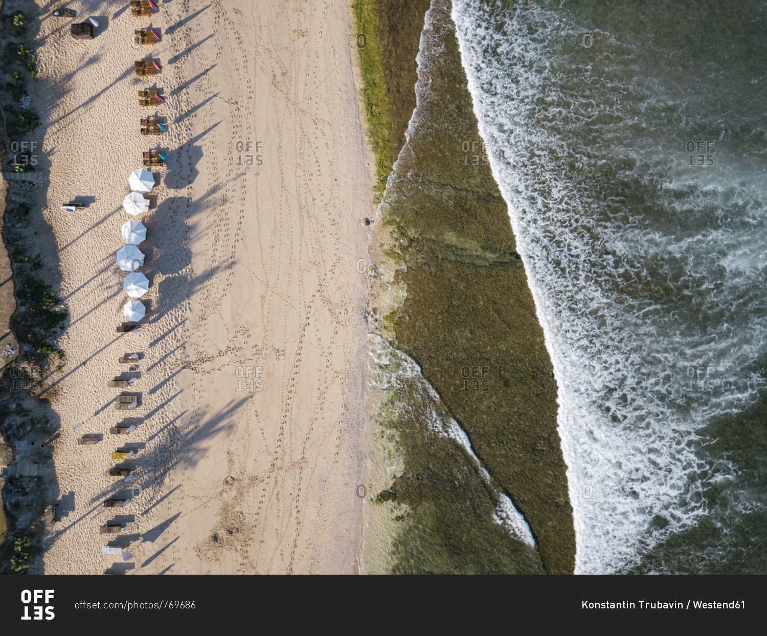Indonesia- Bali- Aerial view of Balangan beach- sun loungers and beach umbrellas