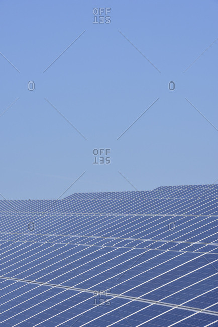 Germany- View of large number of solar panels at solar plant field