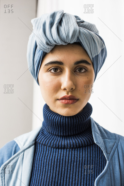 New York City, NY, USA - February 13, 2017: Portrait of model dressed in blue outfit backstage during the Mara Hoffman fashion show