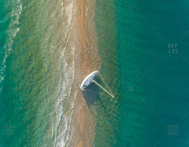 Aerial view of sailboat anchored in the mediterranean sea, Nisi