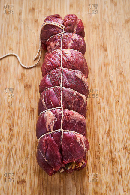 Twine wrapped raw beef - Offset