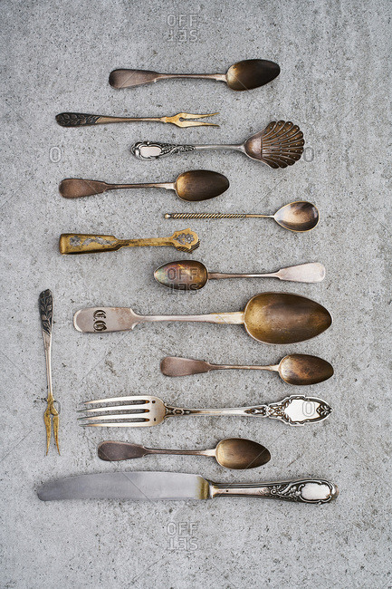 Vintage silverware on gray background