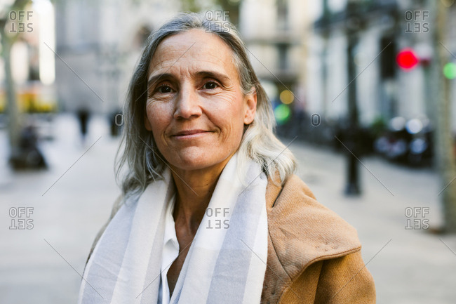 Portrait of a senior woman on the street in winter.