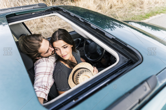 Romantic Young Attractive Couple Watching the Sunset and Kissing with  Sports Car Stock Photo - Image of drive, cheerful: 187752842