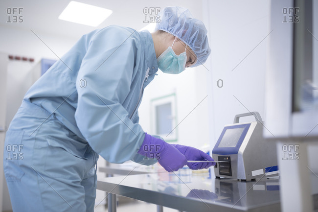 Scientist working in laboratory for drug production