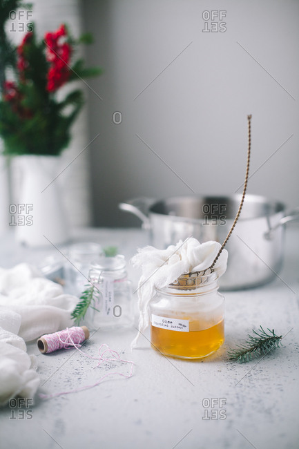 Glass jar filled with freshly made ghee
