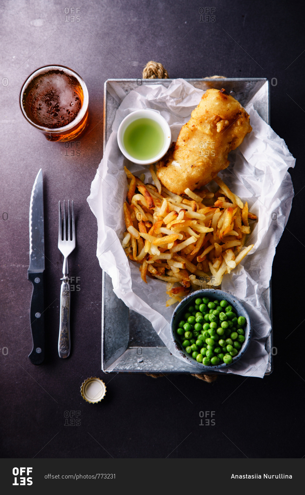 Fish and chips with a glass of beer. British traditional fast food