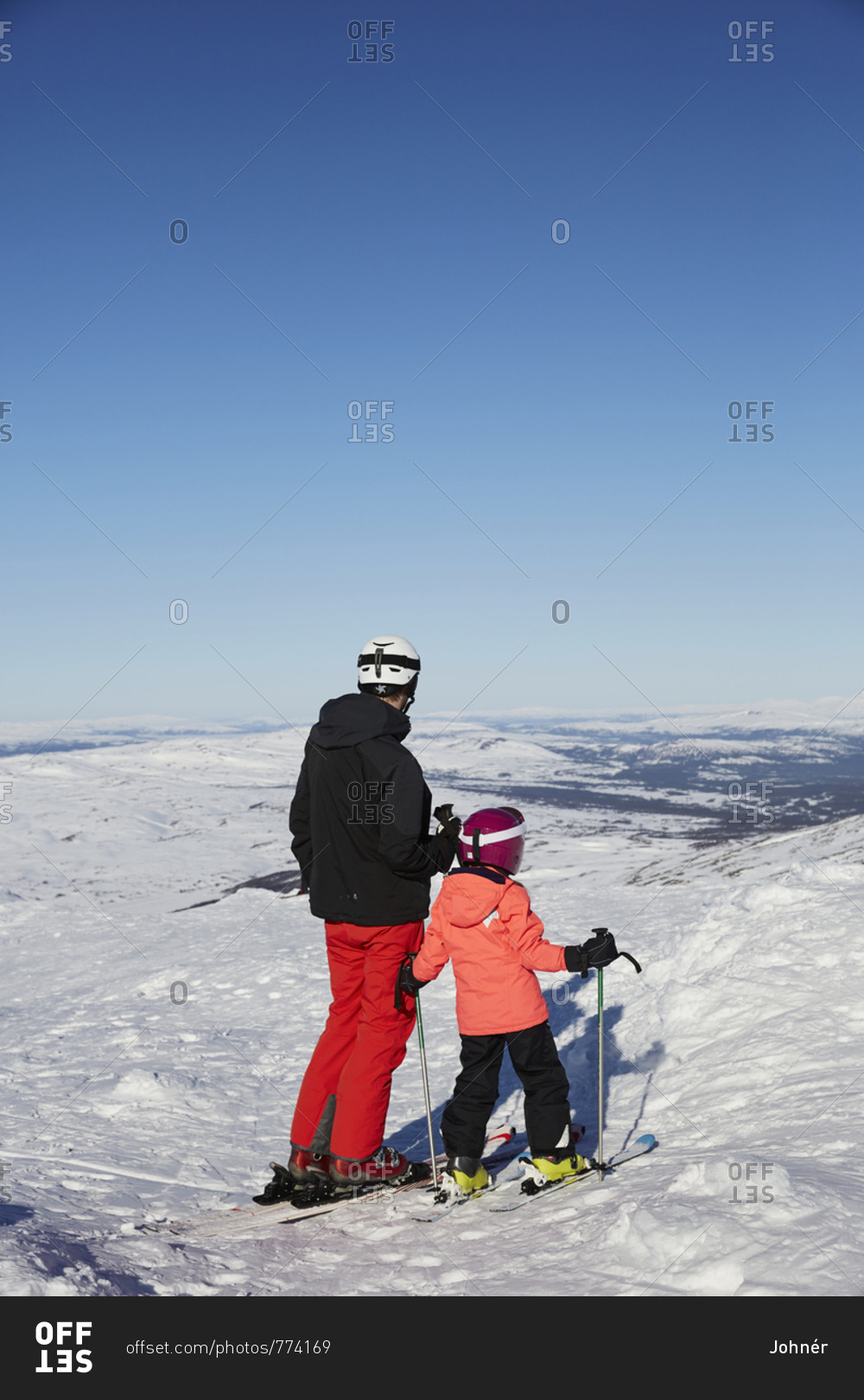 Father and son skiing
