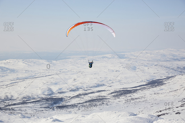 Person paragliding from the Offset Collection